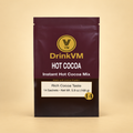 DrinkVM Instant Hot Cocoa Mix 14-sachet box on a warm beige background