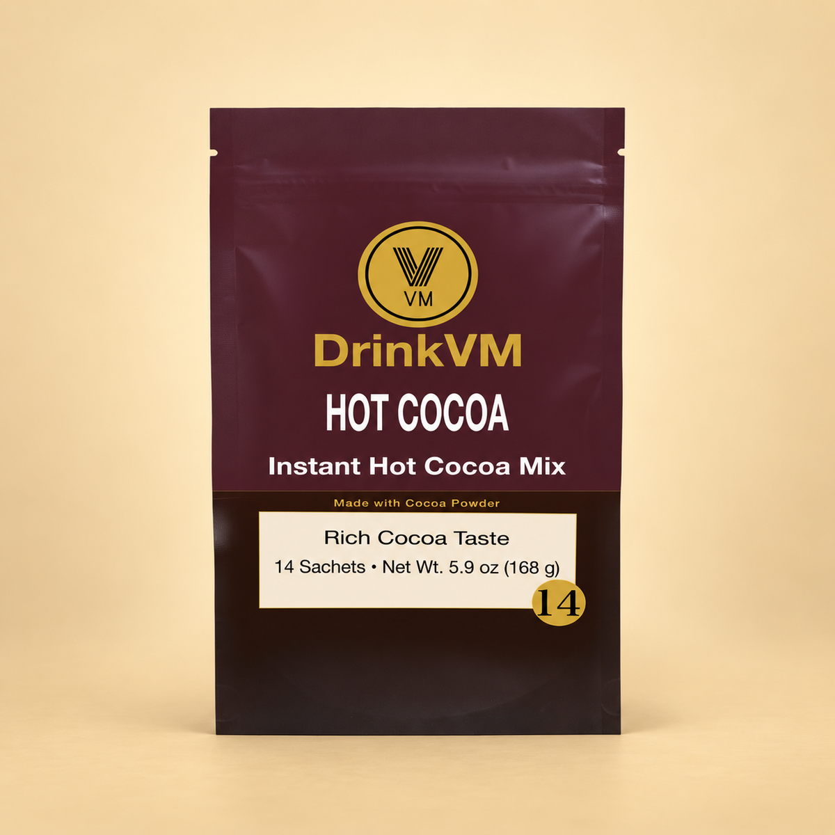 DrinkVM Instant Hot Cocoa Mix 14-sachet box on a warm beige background
